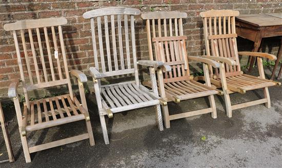 Four folding teak garden chairs